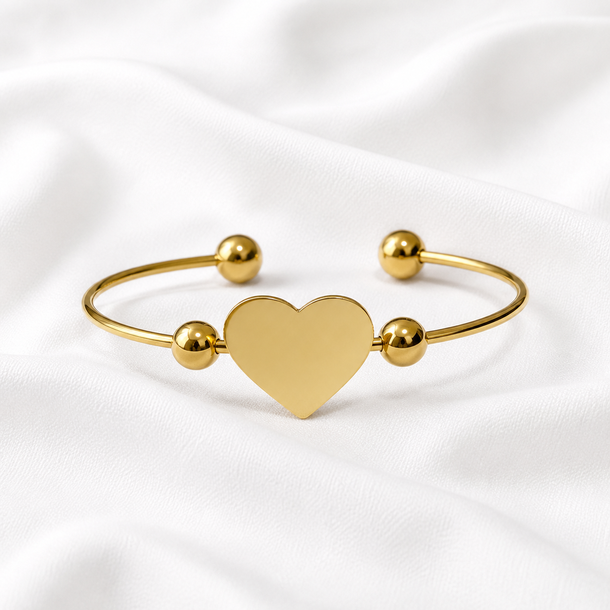 BRACELETE CORA MEIO BOLAS INOX DOURADO
