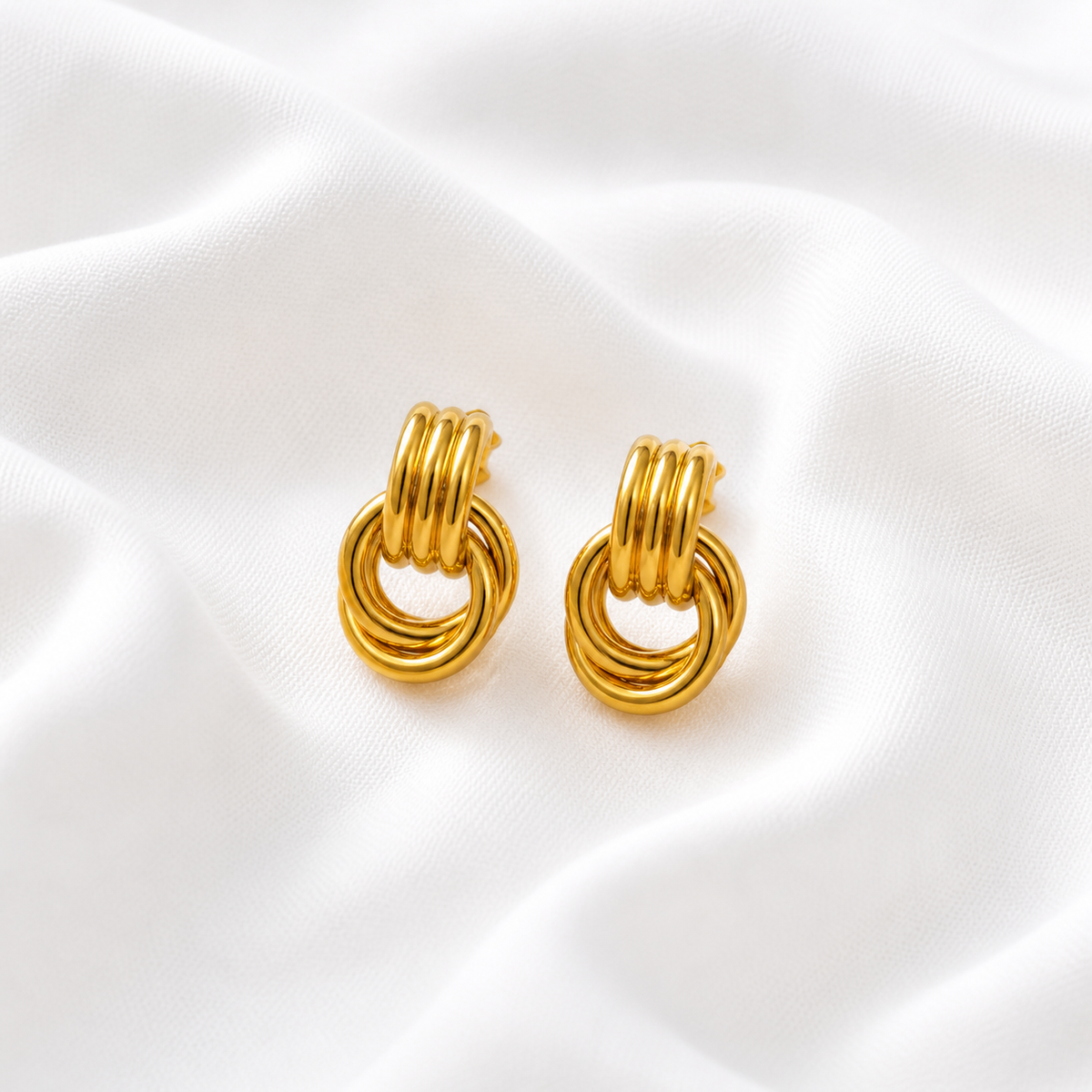 BRINCO AROS TRIPLOS PEQUENO INOX DOURADO