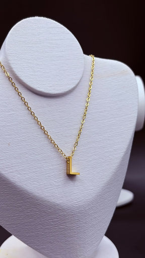 COLAR LETRA INOX DOURADO